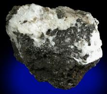 Mineral Specimens: Cesarolite with Calcite from Sidi Amor ben Salem Mine, Al Kåf, Tunisia